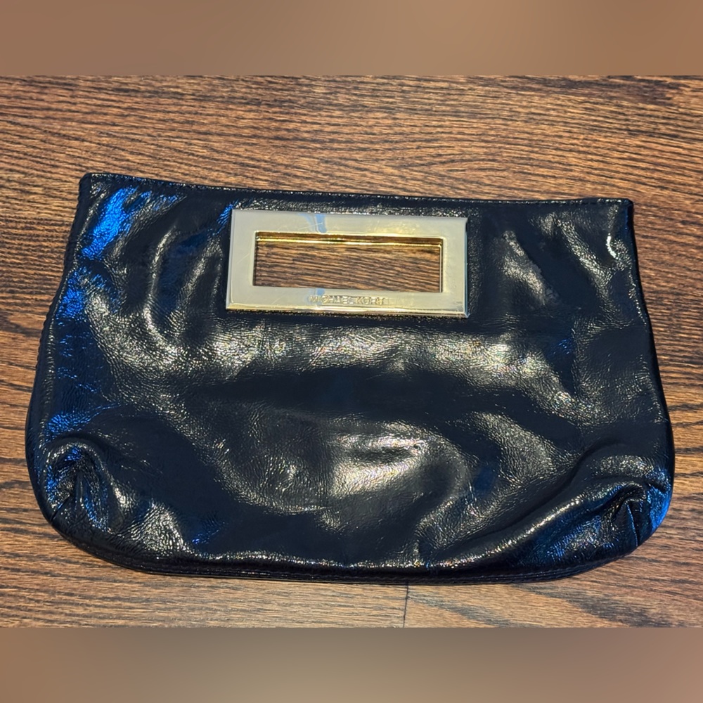 Michael Kora black patented leather and silver clutch purse
